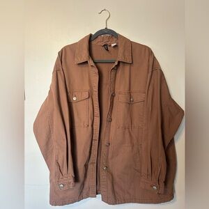 Oversized women’s brown jean jacket